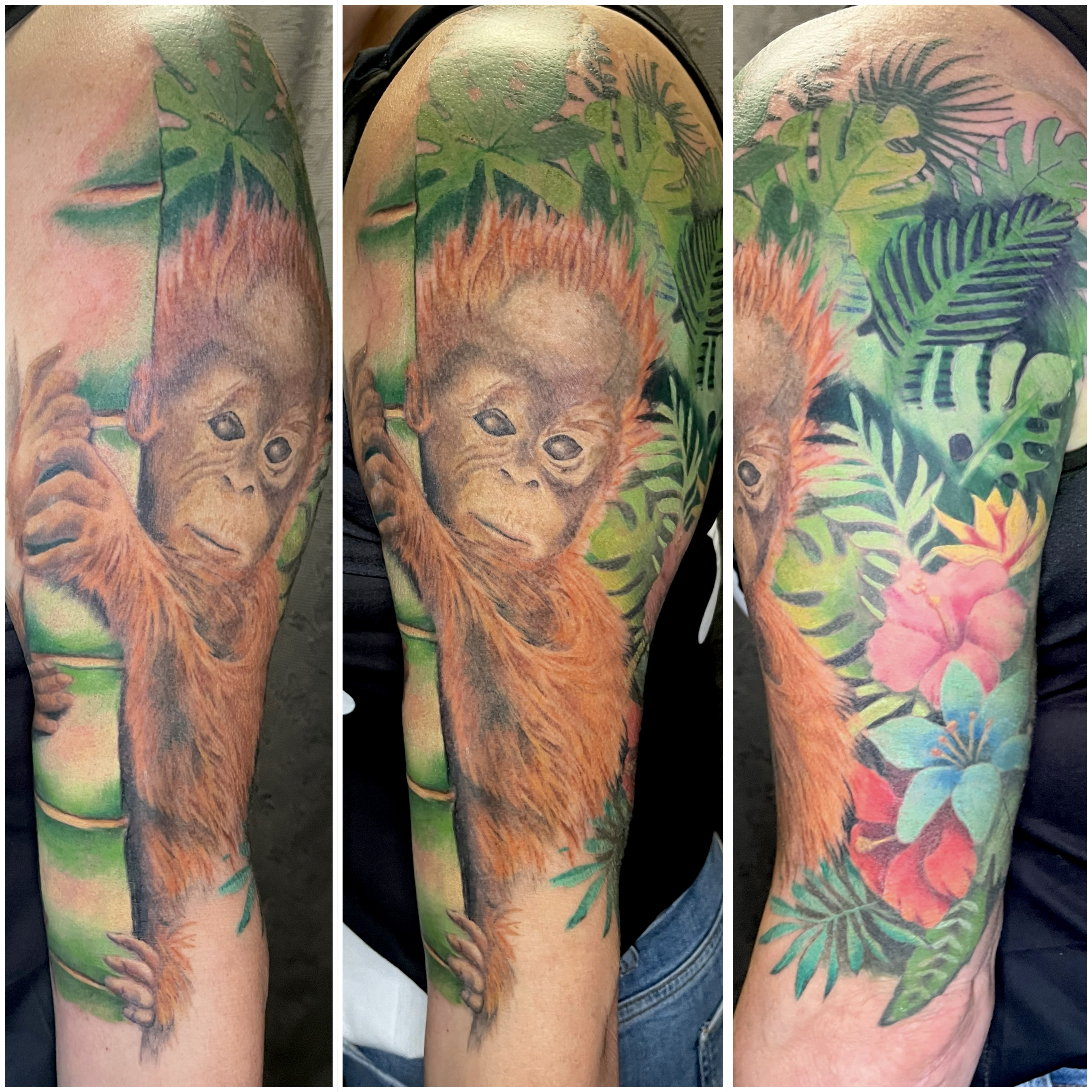 Realistic baby orangutan half sleeve with tropical flowers and foliage by Leo