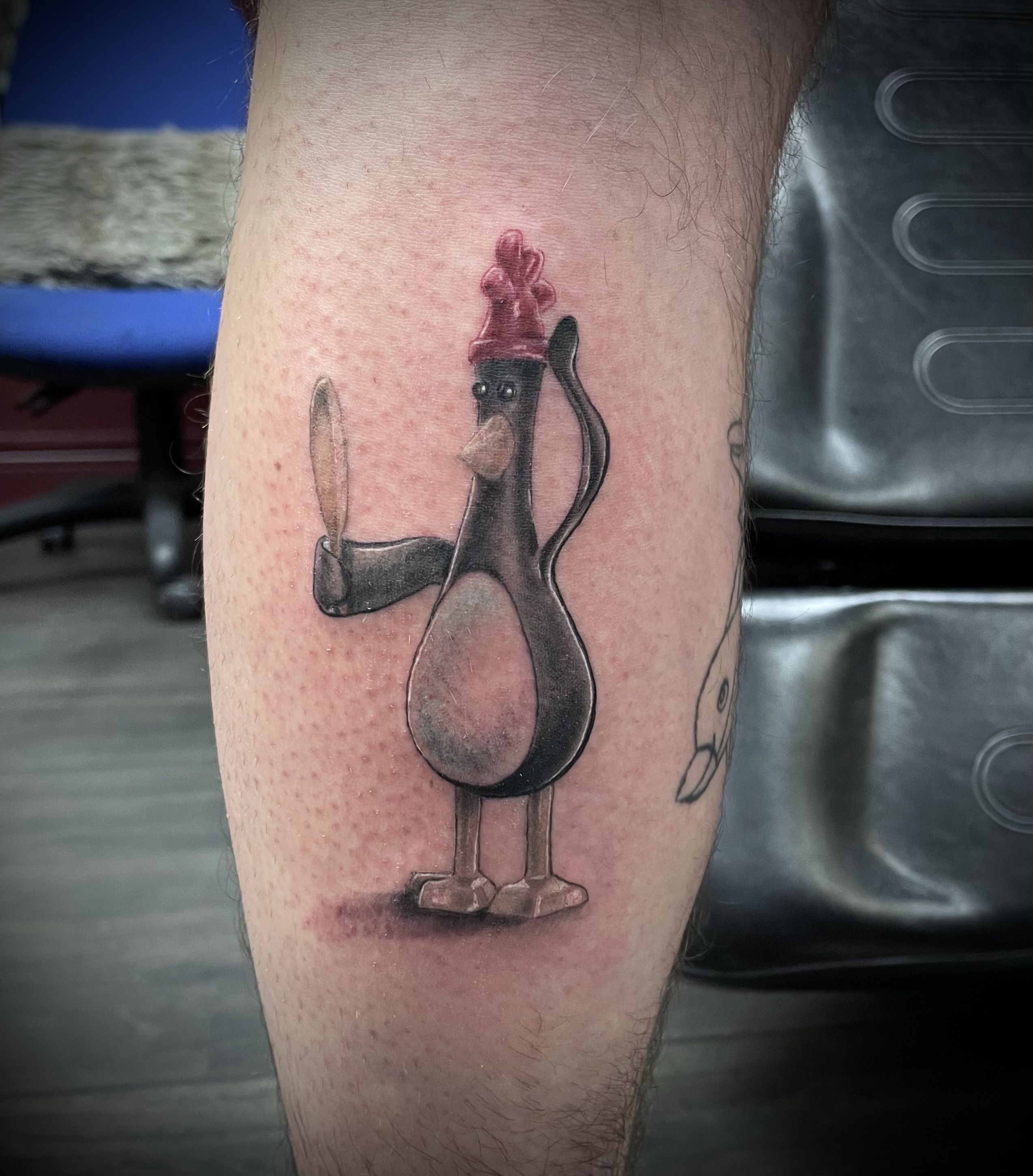 Colour realistic Feathers from Chicken Run holding knife calf piece by Matt