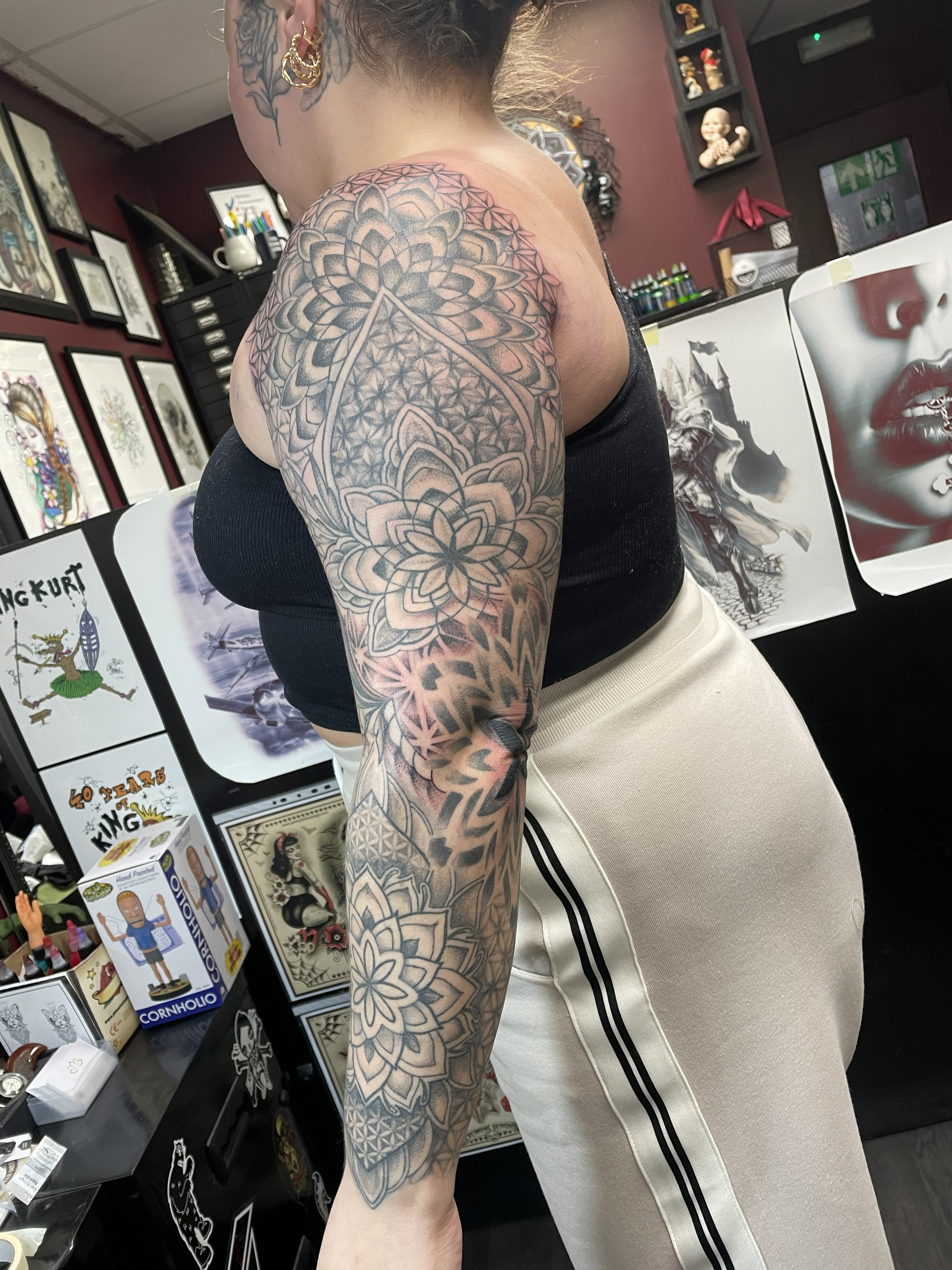 Black and grey geometric mandala full sleeve with dotwork and flower of life patterns by Matt
